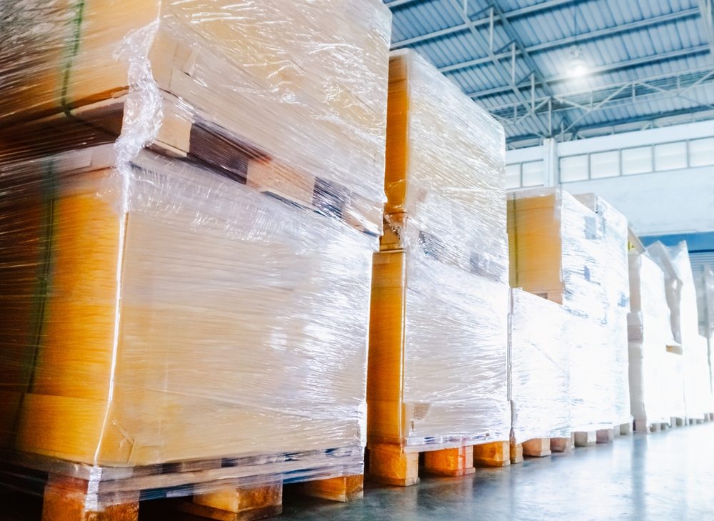 cross docking area with pallets in warehouse 