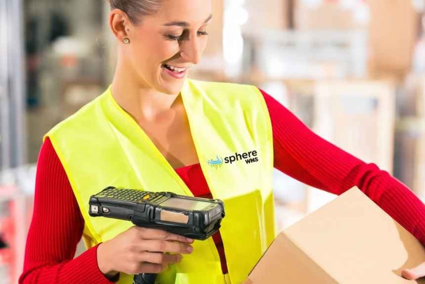 Woman scanning package in warehouse.